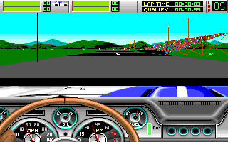 A split-screen view shows a racing game with the upper half displaying a road course stretching toward green hills and mountains under a cyan sky, with grandstands visible along the track. The lower half presents the interior cockpit view featuring a brown steering wheel, analog gauges, speedometer, tachometer, and turquoise accents on the dashboard. A blue and white striped object appears in the middle-right, suggesting motion blur or a passing vehicle. The HUD displays lap information and speed data at the top of the screen.