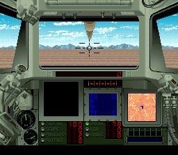 A tank cockpit view displays a forward viewport showing a desert landscape with mountains, blue sky, and another tank in the distance. Below the viewport, the heads-up display contains a black radar grid on the left, a blue targeting/map screen in the center, and a tan-colored tactical map on the right. The instrument panel features red readout indicators and various controls along the bottom, rendered in 16-bit SNES graphics with muted military color tones.