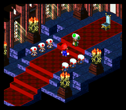 An isometric overhead view of a red-carpeted interior space with blue-tiled floor sections. Multiple sprite characters in colorful clothing are scattered across the room, some standing on the red carpet in the foreground and others positioned on blue floor tiles in the background. The environment features red walls with framed artwork and decorative elements, creating a formal indoor setting. The art style uses 16-bit SNES-era sprites with a fixed isometric perspective and warm indoor lighting.