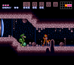 Samus stands on a narrow pink rocky platform in a dark cavern, facing right toward a green enemy creature. The HUD displays energy at 99, missiles 045, super missiles 05, and power bombs 02 in the upper left. A minimap grid appears in the upper right corner. The background shows layered dark blue cavern walls with pink stone formations and purple atmospheric haze, creating depth through parallax scrolling. Sprite-based 16-bit graphics render Samus in her orange power suit against the low-resolution pixel art environment.