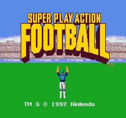 The title screen displays "SUPER PLAY ACTION FOOTBALL" in large yellow letters with a red curved underline against a blue sky background. A pixelated football player sprite stands centered on a green field in front of a stadium grandstand. The Nintendo copyright and trademark information appear at the bottom in white text, dated 1992.