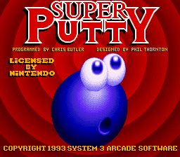 The title screen features a large blue spherical character with white eyes and a dark mouth positioned in the center against a red radial background. White text reading "SUPER PUTTY" appears at the top in a bold, outlined font. Below the title are credits listing programmers and designers. At the bottom, yellow text displays licensing information for Nintendo, and white copyright text for System 3 Arcade Software from 1993. The color palette is predominantly red, blue, white, and yellow with a pixelated 16-bit sprite art style.