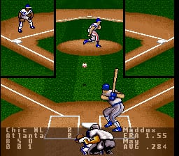 A baseball gameplay screen displays a batter in blue uniform at home plate in the center-lower portion, with a catcher behind him. The infield diamond with bases and dirt paths fills the middle, flanked by three smaller overhead views showing fielders positioned around the field. The green outfield surrounds the infield. UI elements at the bottom show game statistics including score, balls, strikes, and outs in a gray text panel. The 16-bit sprite style and pixelated characters are typical of early SNES baseball games.