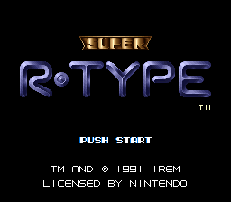 The title screen features the Super R-Type logo in large blue pixelated text with a gold banner above it. Below the title, white text reads "PUSH START" centered on the black background. At the bottom, smaller white text displays "TM AND © 1991 IREM" and "LICENSED BY NINTENDO." The overall aesthetic uses the SNES's 16-bit color palette with a simple, clean layout against a solid black background.