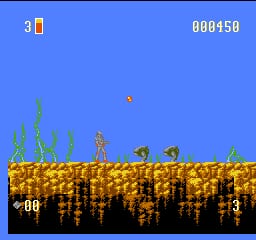 A side-scrolling platformer scene displays a blue sky background with a score of 880450 in the upper right and a lives counter showing 30 in the upper left. The bottom third of the screen shows a brown terrain layer with vertical plant or grass-like sprites protruding upward. A player character stands on the rightmost platform section, while enemies or creatures are scattered across the terrain. The pixel art uses a limited 8-bit color palette with distinct sprite work characteristic of NES-era graphics.