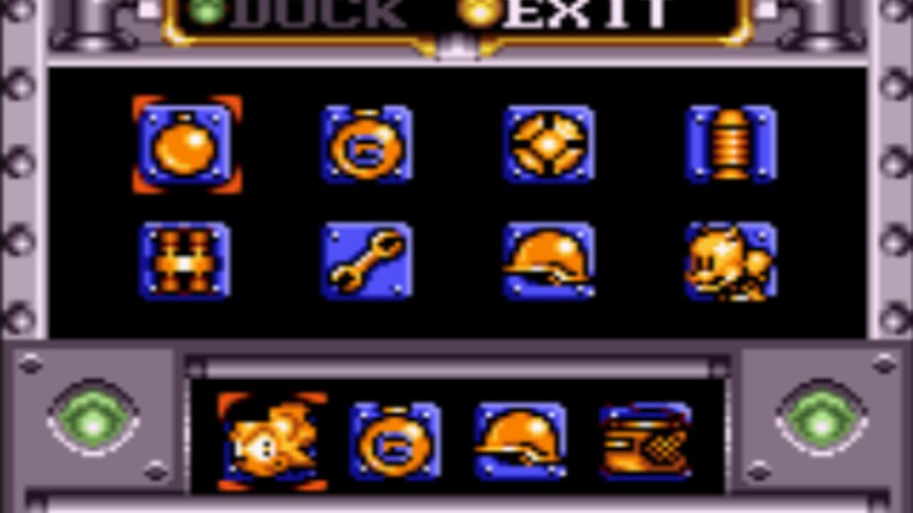 A menu screen displays eight selectable items arranged in two rows, each rendered as small pixel-art icons with blue borders and orange/yellow details against a black background. Items include a sphere, a gear-like object, a crosshair pattern, a cylindrical container, a grid pattern, a wrench, a helmet, and an animal figure. Below this selection grid, a preview row shows four of the selected items in larger detail. The screen is framed by a gray bezel with green circular buttons on the left and right sides, and a gold-trimmed header bar reading "DUCK EXIT" at the top.
