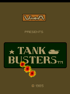 The title screen features a brown background with the Valadon Automation logo at the top. Below that, the text "PRESENTS" appears in thin letters, followed by the main title "TANK BUSTERS" displayed in large gold lettering on a dark green rectangular banner with a gold star and tank icon. Yellow and red pixel-based explosions animate below the banner. The copyright notice "© 1985" is centered at the bottom in small text. The overall visual style uses a limited color palette typical of mid-1980s arcade games, with pixelated graphics and a straightforward layout.