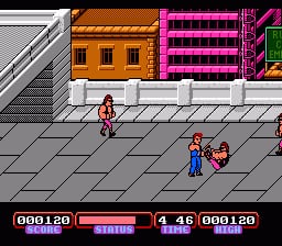 A horizontal beat-em-up scene displays a protagonist in red martial arts attire standing on a tiled gray street in front of orange and magenta building facades. Two other characters in blue clothing stand to the right. The HUD shows two life bars at top left and right corners reading "000120" and "000120", with a timer displaying "4.46" in the center. The sprite-based graphics feature pixelated character models and 8-bit color palette typical of NES hardware.