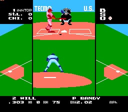 A baseball game in progress shows a player in batting stance at home plate on a red diamond, with a pitcher on the mound above. The field uses a bright green background with red-brown baselines and dirt areas. At the top, a scoreboard displays team names, inning counter, and score: Visitor 0, Home 8. The bottom of the screen shows game statistics including ball and strike counts. A split-screen perspective reveals fielders positioned in the outfield on both left and right sides of the playfield. The NES-era graphics use distinct sprite-based characters with a simple, pixelated art style typical of late 1980s baseball games.