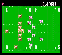 A football field view from above displays two teams of pixelated player sprites in red and white uniforms positioned across the green playing surface. White yard line markers and numbers visible along the field edges. Score display at top shows 0-0. White dots indicate passing routes or player movement paths. The perspective is top-down with minimal animation frames, typical of late-1980s NES sports game graphics rendered in blocky sprites against solid color backgrounds.