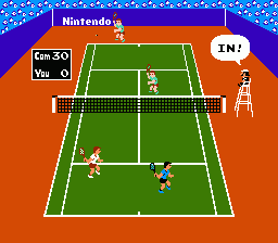 A tennis court viewed from above in perspective, with two players positioned on opposite sides of the net. The player on the left wears white, while the player on the right wears blue. A yellow ball is visible near the center of the court. The court is rendered in green with white boundary lines, surrounded by an orange background. The top-left displays "Game 3(1) You 0" and the top-right shows "IN!" in white text. A spectator figure stands on the right sideline. The sprite-based graphics use the characteristic low resolution and limited color palette of early NES tennis games.