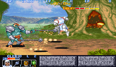 A side-scrolling action scene displays a blue-armored knight character on the left attacking a large armored enemy in the center-right of a grassy outdoor level with mountains in the background. The HUD shows a health bar at top, with the player's remaining lives and items displayed in a four-icon inventory panel at bottom-left. Two dialogue or status boxes appear at the bottom-center with pixelated text. The sprite-based graphics use a bright color palette typical of early 1990s arcade hardware, with parallax scrolling visible in the layered background elements.
