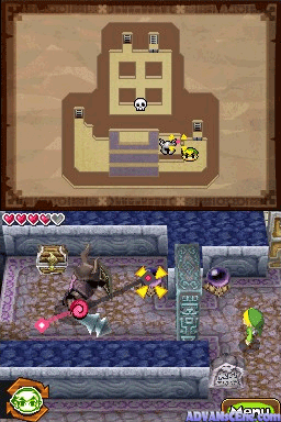 A dual-screen Nintendo DS view displays The Legend of Zelda: Spirit Tracks gameplay. The top screen shows an overhead map with a brown building structure, featuring a grid-like interior layout and a small character icon. The bottom screen shows the main gameplay area with multiple characters scattered across a brick-patterned ground level. A row of hearts appears in the lower-left corner indicating health, and a menu icon is visible in the bottom-right. The art style uses 16-bit era pixel graphics with a warm brown and purple color palette.