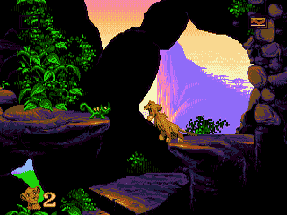 A silhouetted lion character leaps across a wooden platform in a cavern setting. Vibrant purple and yellow gradients fill the background sky visible through a large cave opening. Green foliage appears in the upper left and right edges. Brown rocky platforms and debris dominate the foreground. A small health or score counter displaying "2" is visible in the lower left corner. The sprite uses high contrast blacks against colorful background layers, typical of 16-bit platformer aesthetics.