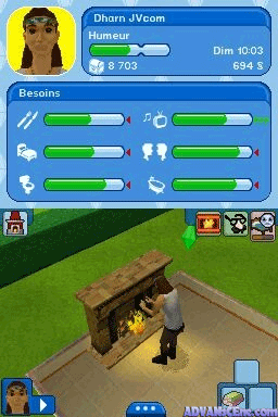 A character selection or status screen displays a Sim named Dharm JVcom with the Humeur trait active. The top panel shows character portrait, name, trait bar, and stats (Dim 10:03, 694$). Below, a Besoins panel lists eight need meters in green, arranged in two columns with icons for hunger, energy, bladder, hygiene, and other vital stats. The lower half shows an isometric game view with a Sim standing near a wooden chest on a tan floor surrounded by green grass. Small UI icons line the bottom, including inventory and action buttons.