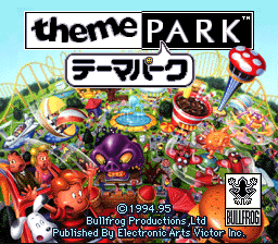 The title screen displays "theme PARK" in large black and white letters at the top, with Japanese text "テーマパーク" below. A colorful amusement park scene fills the background, showing roller coasters, rides, and attractions rendered in bright reds, yellows, purples, and greens against a light blue sky. A pink lollipop graphic appears in the upper right. Copyright text and publisher information for Bullfrog Productions and Nintendo appear at the bottom in small print, alongside a Nintendo Seal of Quality badge.