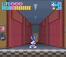 Buster Bunny stands in the center of a corridor lined with red double doors on both sides, rendered in 16-bit pixel art against a checkered floor. The HUD displays a life bar with hearts at the top left, a dash meter in yellow, and a score of 00 with a star multiplier showing x00 in the top right. A small item icon appears in the upper left corner. The ceiling is plain gray, and the overall color palette uses warm reds and earth tones.
