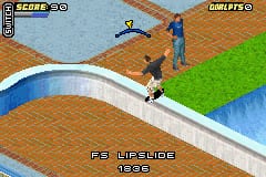 A skateboarder in blue performs a trick over a curved white ramp in a residential area with brown brick and green grass. The HUD displays a score counter in the top-left corner, with a timer showing 58 seconds remaining in the top-right. The isometric perspective reveals multiple pathways and platforms, with additional skateboarders visible in the background near buildings. The color palette uses earthy browns, bright greens, and blue water, rendered in the pixelated style typical of Game Boy Advance graphics.