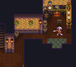 A multi-room dungeon layout displayed in an isometric perspective with brown brick walls and tan tiled flooring. A player character in red and white clothing stands in the right portion of the map. The upper left shows a separate chamber with golden-brown coloring, while a dark blue area occupies the lower right. Various game interface elements and icons line the right edge of the screen. The pixel art uses warm earth tones with detailed sprite work typical of 16-bit RPG graphics.