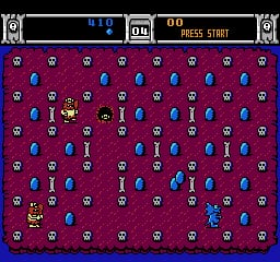 A maze-like purple playing field fills the center of the screen, populated with small white skull enemies scattered throughout and blue power-up items clustered in groups. At the top, a black status bar displays the score reading 810, a timer showing 00, and text reading PRESS START. The player character, a small yellow creature, is positioned in the middle-left area of the maze. The entire scene uses a limited 8-bit NES color palette with dark blue borders framing the gameplay area on all sides.
