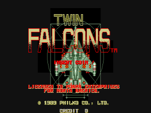 The title screen displays "TWIN FALCONS" in large orange and yellow pixelated letters against a black background. Below the title, two identical green aircraft face each other symmetrically in the center. Red text reading "FIRST WAR" appears beneath the jets. At the bottom, yellow and red text lists copyright information for 1989 Philko Co., Ltd., with additional arcade credit text in smaller font. The color palette uses bright neon-style yellows, oranges, greens, and reds typical of late-1980s arcade graphics.