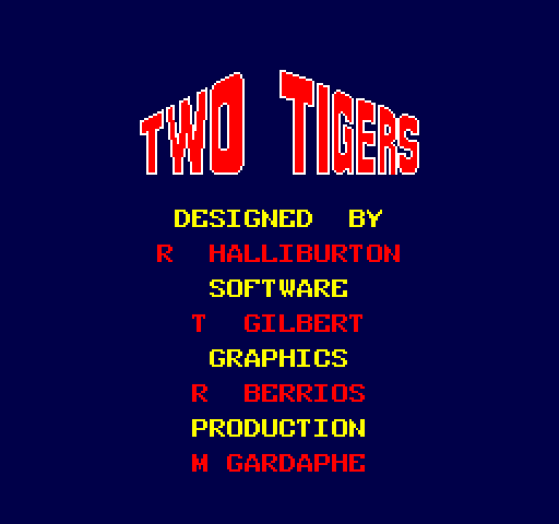 The title screen displays "TWO TIGERS" in large red pixelated letters at the top center against a dark blue background. Below the title, yellow and red text lists credits: "DESIGNED BY" in yellow, followed by "R HALLIBURTON" in red and "SOFTWARE" in yellow; "T GILBERT" in red with "GRAPHICS" in yellow; "R BERRIOS" in red with "PRODUCTION" in yellow; and "M GARDAPHE" in red at the bottom. The text is centered and arranged vertically in a standard arcade credit screen layout.