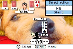A close-up of a dog's face dominates the center of the screen with brown and tan coloring. At the top, a blue action menu panel displays options including "Hit" and "Stand" in white text. The upper left shows a card game interface with playing cards visible, including what appears to be a red suit card marked with numbers and symbols. At the bottom, black button prompts indicate "Select" and "START Menu" controls. The overall art style uses low-resolution sprite graphics typical of Game Boy Advance games, with a warm color palette of reds, browns, and yellows dominating the background.
