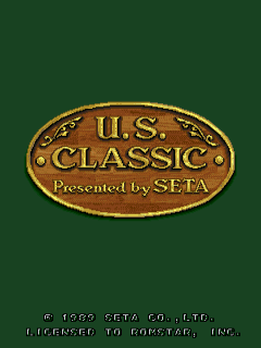 An oval gold badge with decorative flourishes displays the text 'U.S. CLASSIC' in capital letters, with 'Presented by SETA' on a banner below. The badge sits centered against a dark green background. Copyright text for SETA Co., Ltd. and a licensed notice appear at the bottom of the screen in small white typography.