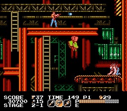 A side-scrolling action scene displays a protagonist in yellow clothing suspended from a rope or cable in the center of the screen, positioned within an industrial warehouse structure composed of red and green metal beams and platforms. A horizontal score panel spans the top showing stage number, time remaining, and life count in green text. The background features a dark purple gradient with geometric crosshatch patterns in tan, creating depth. An enemy sprite appears in the upper right corner. The foreground uses layered red and green rectangular shapes to suggest multiple planes of industrial architecture.