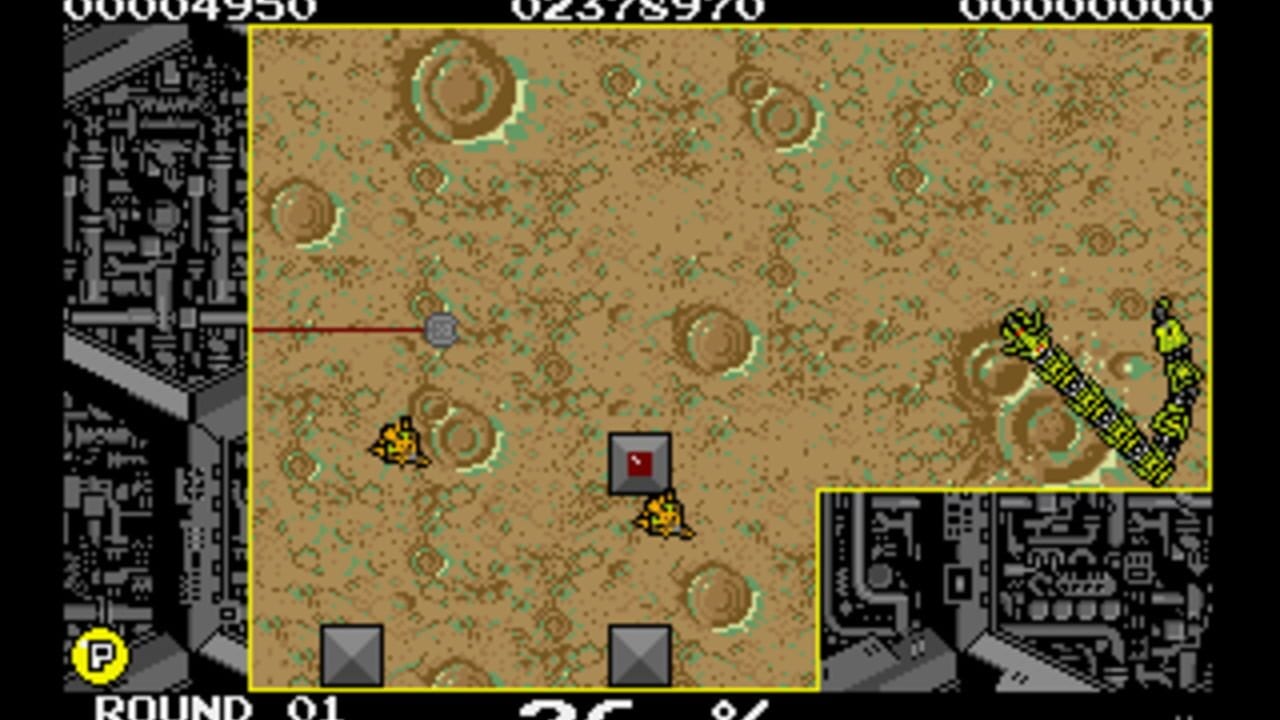 A desert landscape with tan sand dotted with circular patterns in green and brown. A gray square block with a red interior sits in the center, flanked by two yellow pixelated characters. Two additional yellow characters appear in the upper left and right areas. Large green geometric shapes occupy the right edge. Gray square blocks are positioned in the lower corners. A black interface panel on the left displays floor plan details, while a similar panel on the right shows weapon or item selection. Numerical displays at the top show scores or counters, with 'ROUND 01' visible at the bottom left.