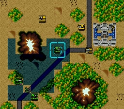 An overhead tactical view shows a sandy terrain map with green tree clusters scattered throughout. Two large explosion effects with yellow and white bursts occupy the left and lower-right portions of the screen. Blue water channels form paths across the landscape, connecting small blue base structures. A player unit or building sits in the center-left area. The right side displays a game interface panel with blue borders containing what appears to be unit or building information icons and status indicators. The color palette uses tan sand, green vegetation, and blue water against a pixelated SNES-era sprite style.