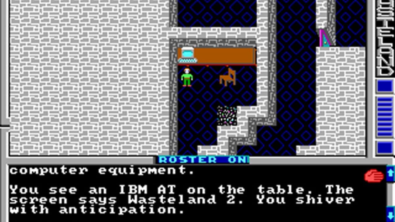 A top-down dungeon view shows a green-clothed player character standing in a stone-walled room with an orange desk and brown dog. The surrounding areas feature blue diamond-patterned walls separated by gray stone corridors. A text panel at the bottom displays cyan "ROSTER ON" text and describes finding an IBM AT computer on a table labeled Wasteland 2. The interface includes a blue sidebar with status bars on the right edge. Pixelated 8-bit sprites and monochrome brick textures dominate the visual style.