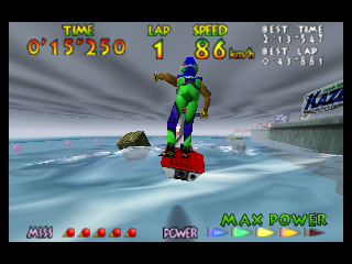 A jet ski rider in bright green and red clothing speeds across blue water toward a small island in the distance. The HUD displays the time 0'19.30, lap number 1, speed 86 km/h, and position metrics in the upper corners. At the bottom left, five red circles represent health or damage status, while bottom right shows POWER and MAX POWER indicators. The sky features gray-white clouds above a calm ocean with realistic water reflections. The 3D graphics show characteristic N64-era polygon modeling with smooth curves on the water surface and distant shoreline.