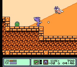 A blue robot character stands on an orange brick platform in the center of the screen, facing right. A green creature appears to its left, while a white bird flies above. The level features brown and orange brick blocks arranged in a tiered formation. At the bottom, a green HUD displays the score (0490), remaining lives (shown as small icons), and other game information against a light beige background. The sprite-based graphics use a limited NES-era color palette with pixelated characters and detailed brick textures.