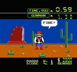 A pixelated cowboy character stands in the center of a desert landscape with red rock formations on the left and a green cactus on the right. The ground is orange-brown with scattered tumbleweeds. A speech bubble above the cowboy reads "FIRE". The top of the screen displays a timer showing 0.53, "GUNMAN" label, and a score readout of 1.90. The bottom black bar shows score 00000, 4 remaining targets, 3 shots fired, and 2800 reward points in pixel font against a blue sky background.