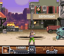 A character in a green outfit stands in the center of a Western town street, facing a restaurant building with wooden brown and tan facade. A red truck is visible on the right side. The HUD displays health at 14980 and ammo at 55 in the lower-left corner, with character portraits and additional stats in a brown panel at the bottom. Purple-toned sky and buildings fill the background, showing a pixel-art Western setting with dust effects around a circular fountain area in the foreground.