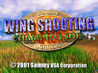 The title screen displays 'Sammy Wing Shooting Championship' in large blue and yellow lettering centered on the image, with 'Outdoors' in green text below it. A wooden oval emblem frames the title. The background shows a natural outdoor landscape with green grass, water, and a blue sky with white clouds. A small white flying bird appears in the upper right. Copyright text for 2001 Sammy USA Corporation is visible at the bottom center.