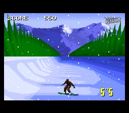 A snowboarder in a dark silhouette performs a jump or trick on a snowy slope, centered in the lower portion of the screen. The background features a winter landscape with pine trees flanking a blue-purple mountain vista under a starry night sky with visible snowfall. A curved white snowy path flows through blue water or terrain below. The HUD displays "SCORE" and "550" in the upper left, "HARD" in the upper right, and "5'5" in yellow text in the lower right. The 16-bit sprite graphics use a limited color palette typical of SNES hardware.