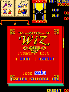 The title screen displays a large red background with ornate gold decorative borders framing the word 'WIZ' in yellow serif lettering at center. Below the title appear the Japanese characters and text 'INSERT COIN', '1 COIN 1 CREDIT', the year '1995', and 'SEIBU KAIHATSU INC.' at the bottom. The top of the screen shows a score display reading 'HI-SCORE 00000', '1UP 00', and '2UP 00' in yellow text. Small pixel-art sprites of characters and objects appear in the upper corners against the red backdrop. The arcade cabinet credit counter is visible at the very bottom of the screen.