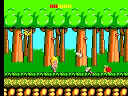 A side-scrolling platformer level displays a bright green sky with repeating wave patterns at the top, a row of brown tree trunks in the middle ground against cyan sky, and a grass-covered ground plane with brown brick-pattern blocks at the bottom. A small pixelated character sprite stands on the grass terrain. The HUD shows a red "LIFE" label and score display across the top of the screen. The art style uses 8-bit sprite graphics with a limited color palette of greens, browns, cyan, and oranges.