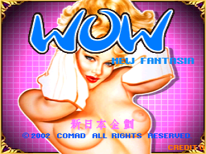 The title screen displays a pink grid background with a stylized female character in the center wearing white clothing, posed with arms raised. Blue outlined text reading 'WOW' appears at the top in large letters, with 'NEW FANTASIA' in smaller text to the right. Copyright information for Comad All Rights Reserved and the year 2002 appears at the bottom in white text. The overall color scheme uses bright magentas, blues, and oranges typical of early 2000s arcade game aesthetics.