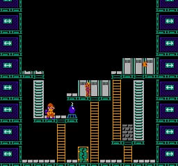A red-clothed character stands on a platform in the lower-left area of a multi-level industrial structure made of brown and yellow girders. Green barrels and white platforms form the main level architecture. The playfield is bordered by a green and purple pixel-art frame on both sides, with small UI elements visible along the edges. The background is solid black, and the overall sprite resolution is characteristic of early NES graphics.