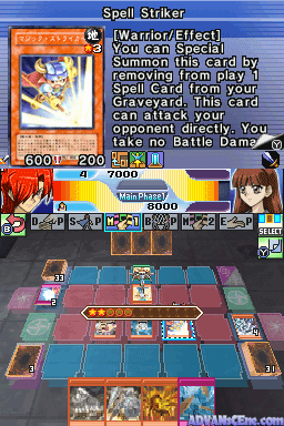 A Yu-Gi-Oh! trading card game interface displays the Spell Striker card in the upper-left, showing its orange card artwork and text describing its warrior effect and special summoning conditions. Below, a duel field spans the lower two-thirds with a grid-based layout in blue, green, and purple tones. A female character with brown hair appears in the bottom-right corner. Monster card thumbnails line both sides of the field. A status bar at the bottom shows numerical stats including life points (8000) and a row of card selection icons.