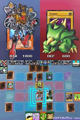 A Yu-Gi-Oh! trading card game interface displays two duel scenes on a Nintendo DS screen. The upper half shows a character with spiky hair and armor-like clothing on the left, with attack and defense stats (ATK 1900, DEF 600) listed alongside a green monster card labeled 'Tonks' on the right. Below is a grid-based card deck or field layout with multiple colored card slots in blue, pink, and brown tones, featuring small card artwork thumbnails arranged across the lower two-thirds of the screen. A game control bar with various UI buttons spans the bottom edge.
