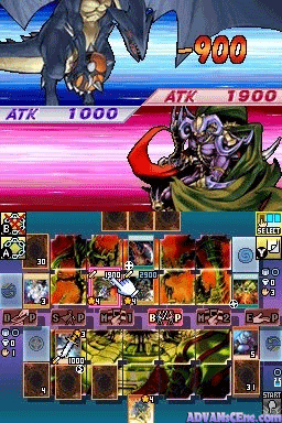 A Yu-Gi-Oh! duel interface displays two players' monsters in combat. The top player's monster shows 900 damage in orange text, while ATK/defense stats of 1000 and 1900 appear in red bars. The bottom player's field contains multiple face-down cards arranged in rows, with a large green-armored creature visible in the center. A colorful card grid menu spans the lower portion showing thumbnail images of various monsters and spell cards. The visual style uses low-resolution sprites and a bright, neon-colored UI typical of Nintendo DS trading card game adaptations.