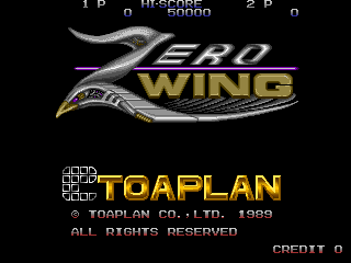 The Zero Wing title screen displays a metallic silver spaceship with swept-back wings at the top center, rendered in a 3D-style sprite. Below it, the yellow text "ZERO WING" appears in bold lettering with a metallic gradient effect. The Toaplan copyright notice and "1989" appear in white text at the bottom left, with "ALL RIGHTS RESERVED" beneath it. "CREDIT 0" is shown in the lower right corner. The background is black, with score displays reading "1 P" and "2 P" at the top left showing 60000 points.