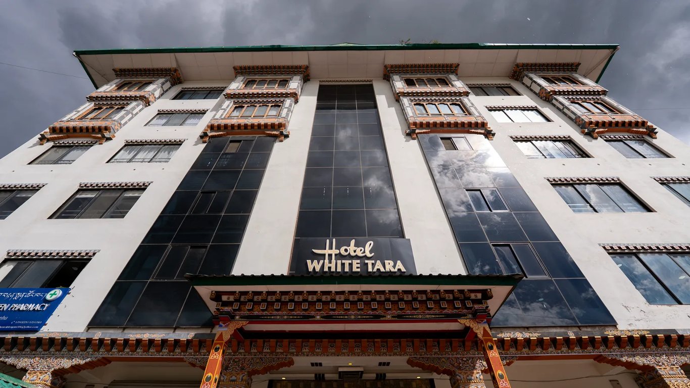 The hotel against a monsoon sky