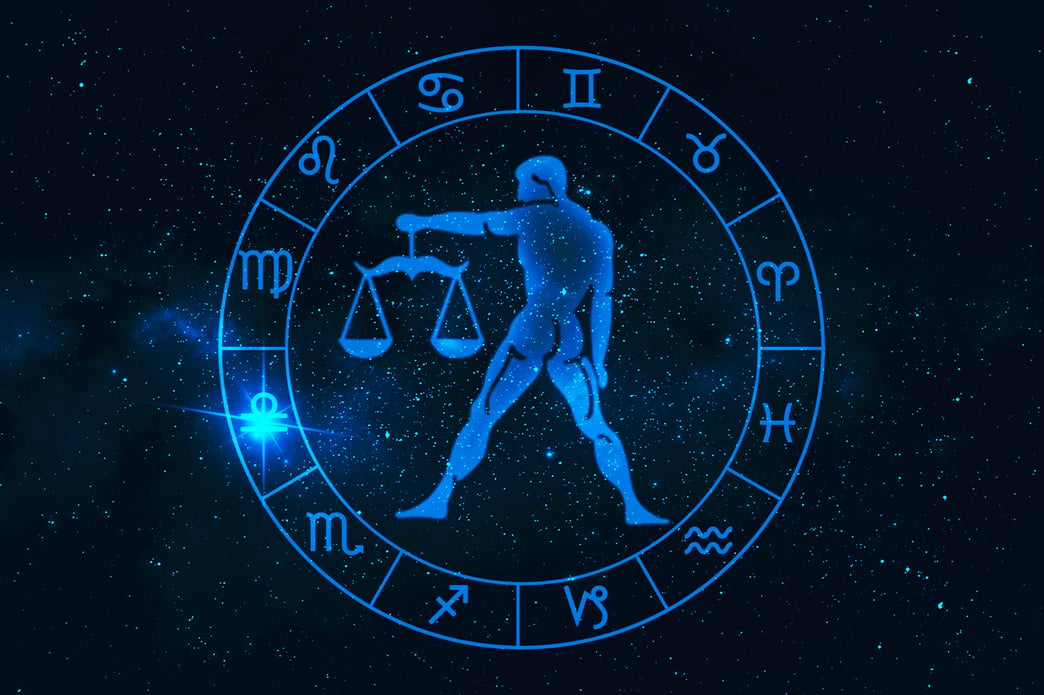 Libra horoscope sign in twelve zodiac with galaxy stars backgrou