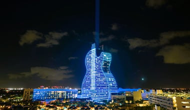 A nighttime aerial perspective of the Seminole Hard Rock Guitar Hotel in Hollywood