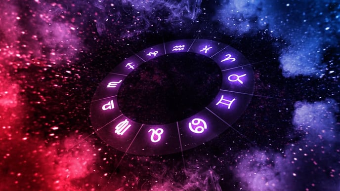 Zodiac signs within a circular horoscope set against a backdrop of the universe, reflecting astrology and horoscopes